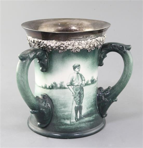 A Lenox Ceramic Art Company golf three handled mug, c.1905, height 6.5in., rim crack
